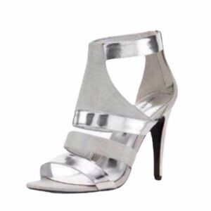 Beautiful strap heels in a shiny and not shiny, two tone finish.